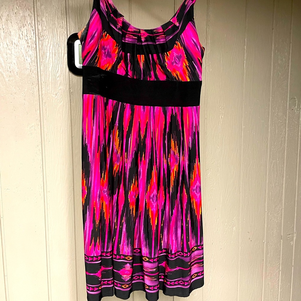 Size 16 sleeveless multiple colorful dress. Length falls just below knees.